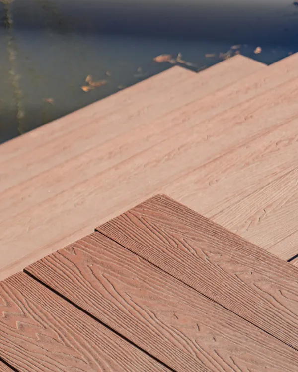 Composite deck stairs with wide treads leading down to a lower level